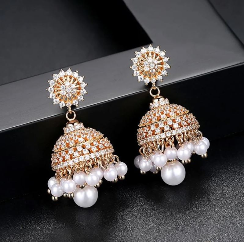 Antique Finish Pearl Bunch Jhumkas From Emblish  South India Jewels  Gold  jewelry fashion Indian jewellery design earrings Gold earrings designs