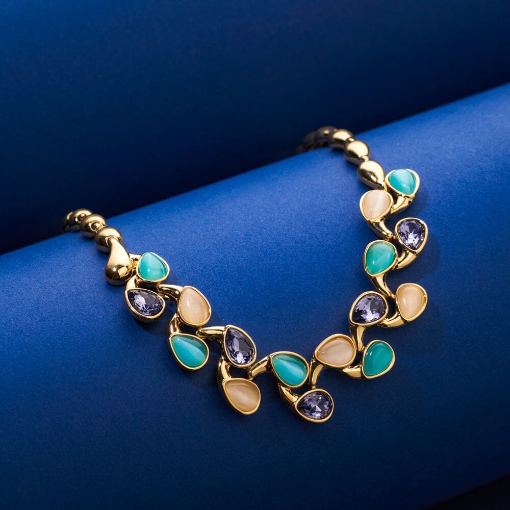 Gold tone block blue stone flower sufi necklace dj-37609 – dreamjwell