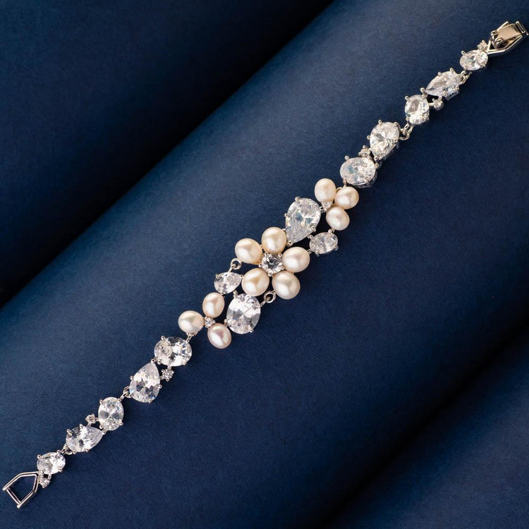 Amazon.com: The Pearl Source 4-5mm Rice Shaped White Freshwater Pearl  Bracelet for Women - Cultured Pearl Bracelet in 925 Sterling Silver with  Genuine Cultured Pearls: Clothing, Shoes & Jewelry