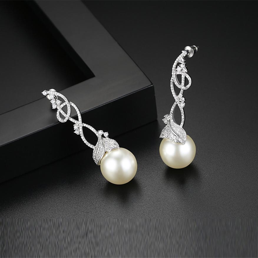 Myra Crystal Pearl Long Earrings - BlingVine